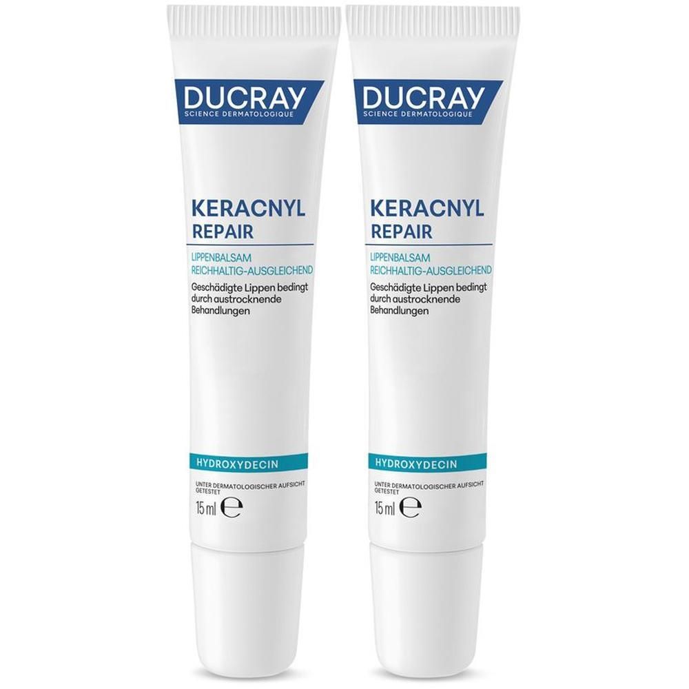 Zwei Tuben Lippenbalsam. Weiß mit blauer Schrift. Aufschrift: DUCRAY, KERACNYL REPAIR, Lippenbalsam, 15 ml.