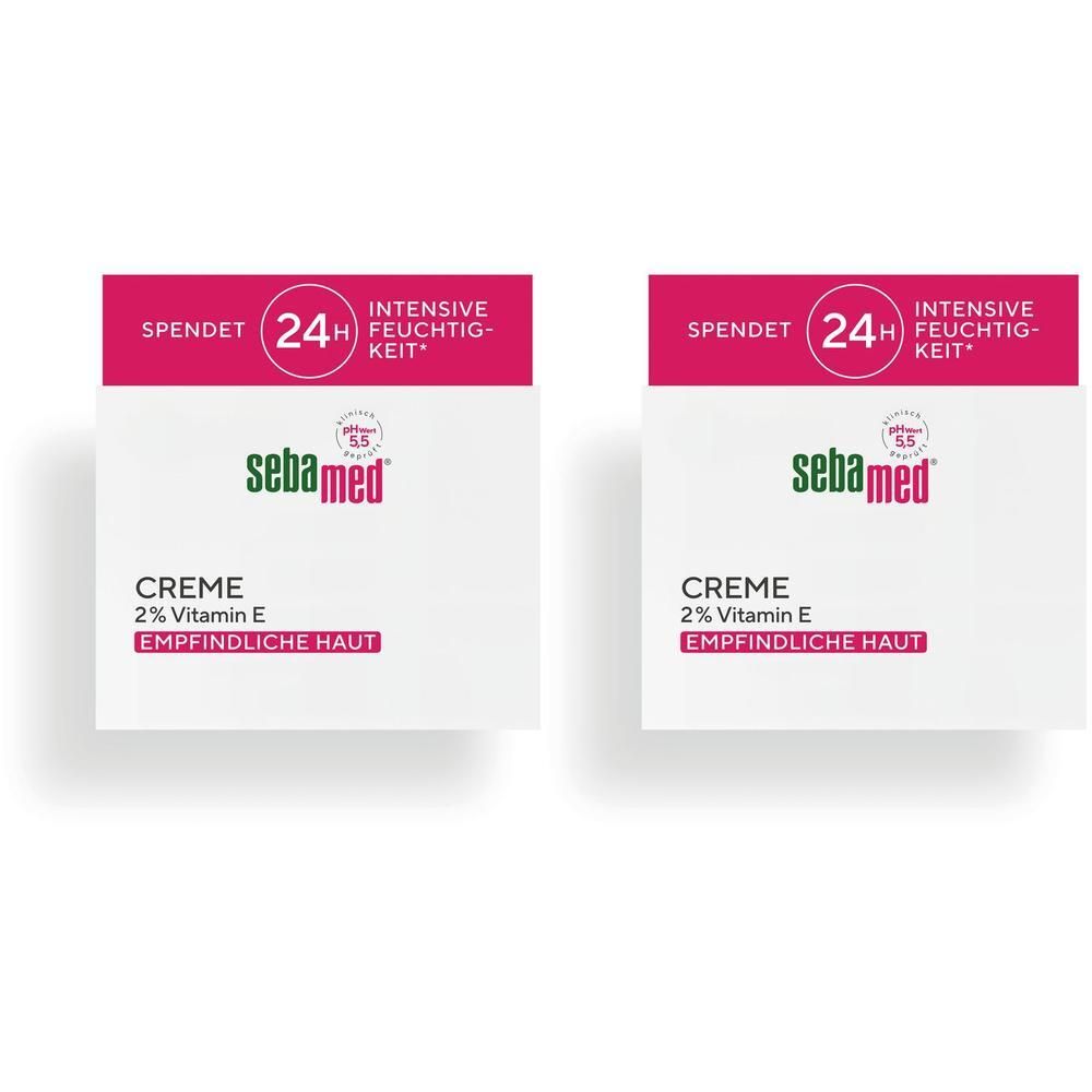 Zwei quadratische Cremepackungen mit rosa und weißen Akzenten. Aufschrift: sebamed Creme, 2% Vitamin E, empfindliche Haut.