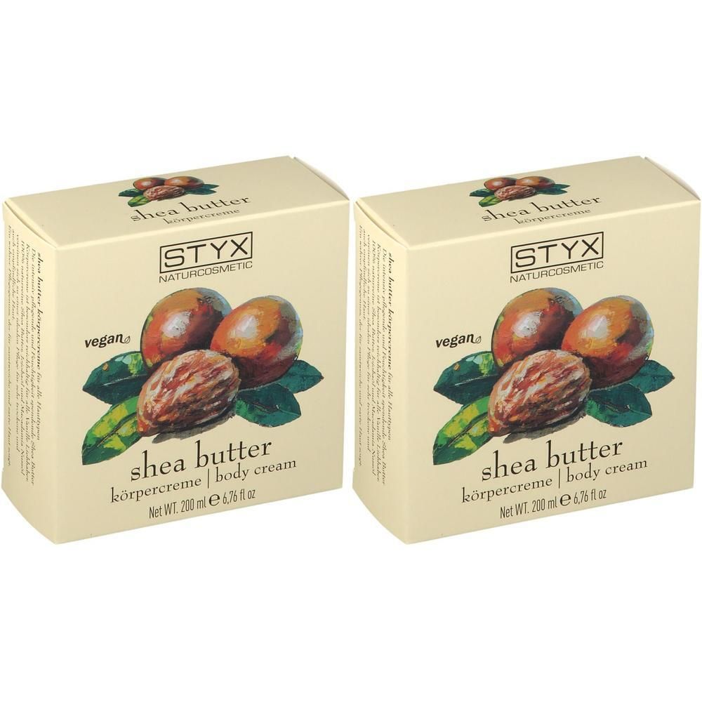 Zwei rechteckige Kartons mit Aufdruck. Aufschrift: STYX, shea butter Körpercreme, vegan. Abbildung von Sheanüssen und Blättern.