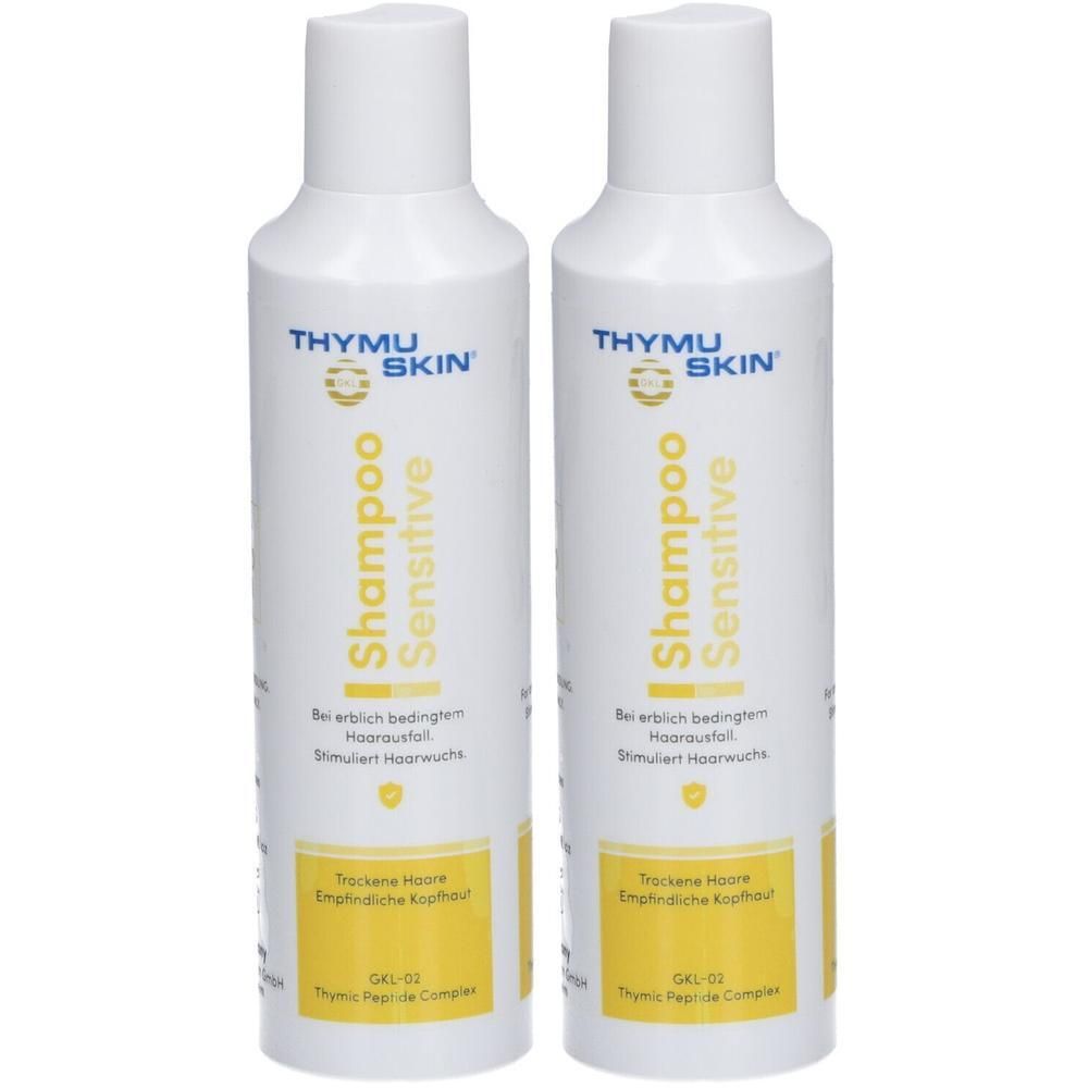 Zwei weiße Flaschen mit gelben Etiketten. Aufschrift: THYMUSKIN Shampoo Sensitive. Text in deutscher Sprache. Flaschen mit weißem Deckel.