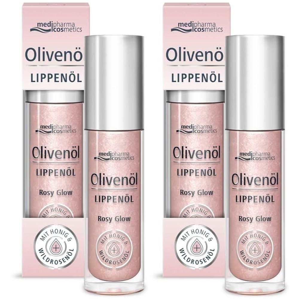 Zwei Lippenöl-Flakons mit Rosy Glow. Rosa Flüssigkeit in Glasflaschen mit silbernem Deckel. Verpackt in rosa Kartons.