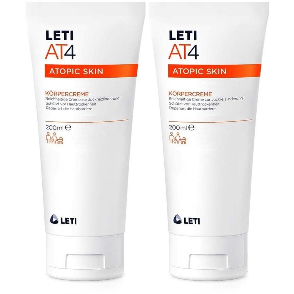 Zwei Tuben LETI AT4 Körpercreme. Weiße Tuben mit orangefarbenen Akzenten. Text: AT4, ATOPIC SKIN, KÖRPERCREME, 200ml, LETI Logo.