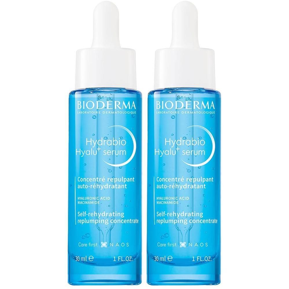 Zwei blaue Serumflaschen mit weißen Deckeln. Aufschrift: BIODERMA Hydrabio Hyalu+ serum. 30 ml.