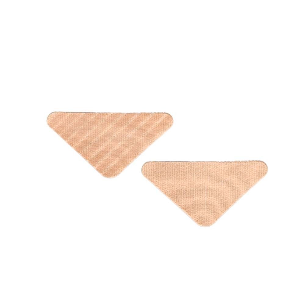 Zwei beige, dreieckige Gesichtspflaster. Die Oberfläche ist strukturiert.