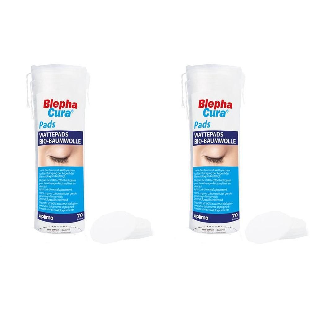 Zwei zylindrische Behälter mit Wattepads. Aufschrift: Blepha Cura Pads, Wattepads Bio-Baumwolle. Einige Pads liegen daneben.