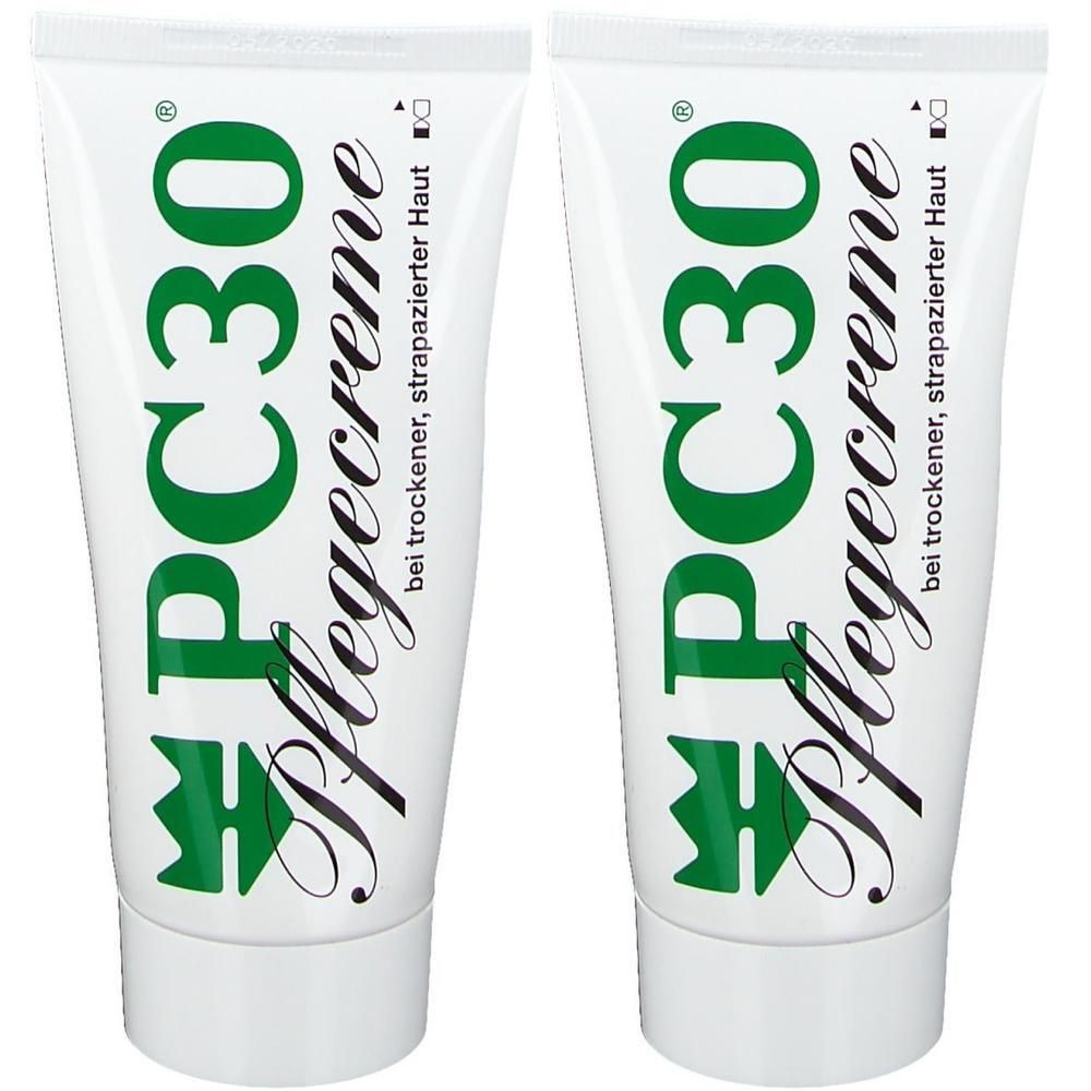 Zwei weiße Tuben mit grüner Aufschrift PC30 Pflegecreme. Text: bei trockener, strapazierter Haut.