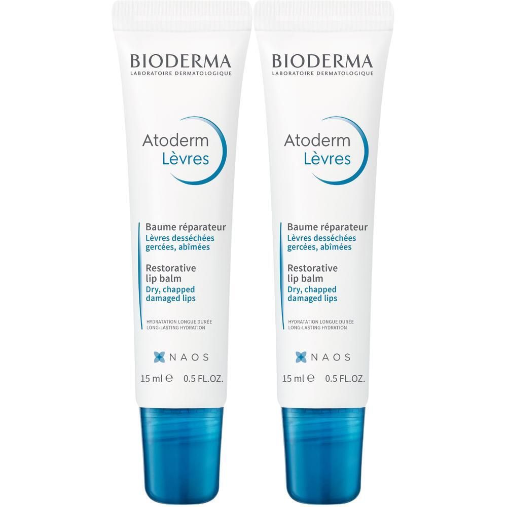 Zwei Tuben Lippenbalsam. Weiß mit blauer Schrift und Kappe. Aufschrift: BIODERMA, Atoderm Lèvres, Baume réparateur, 15 ml.