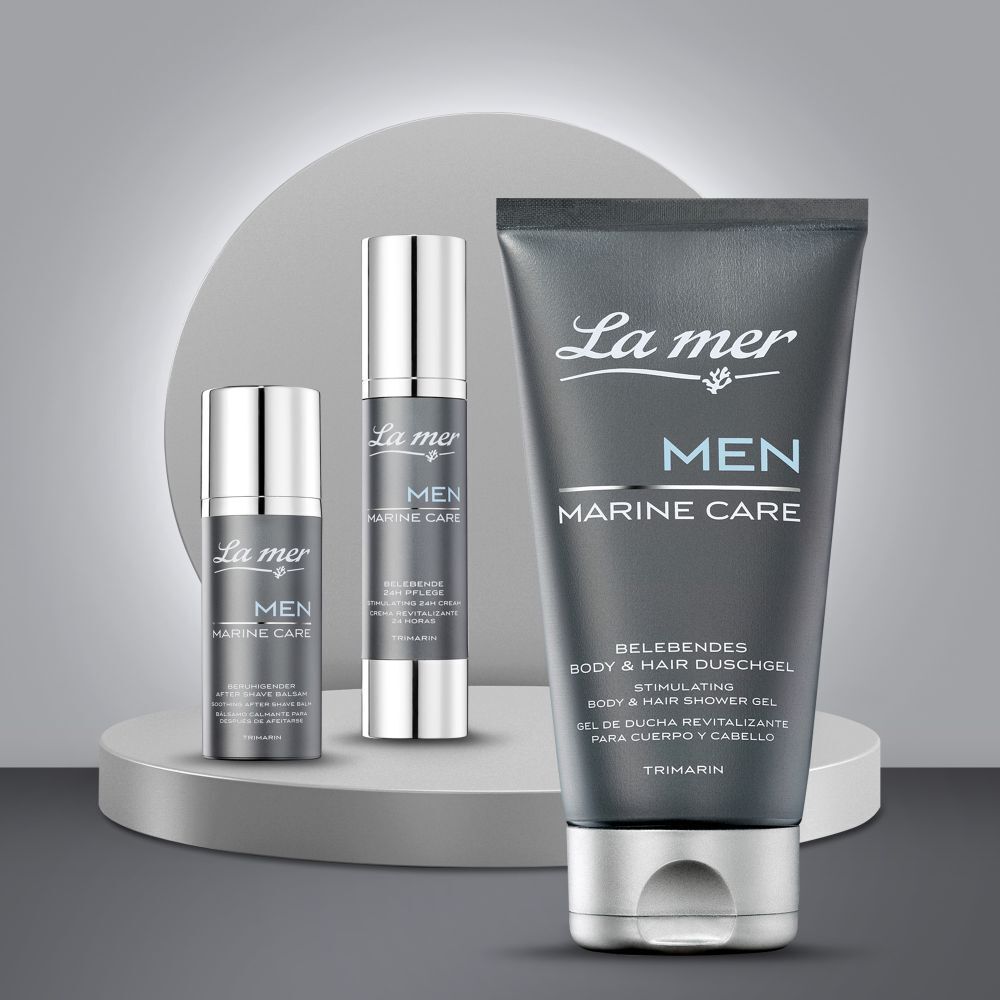 Drei Produkte La Mer Men Marine Care. Flakon, Tube und Flasche. Text: Men, Marine Care, belebendes Body & Hair Duschgel.