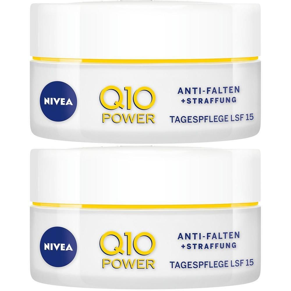 Zwei Tiegel NIVEA Q10 Power Tagespflege LSF 15. Weiße Tiegel mit gelben Akzenten und blauen Logos. Text: Anti-Falten + Straffung.