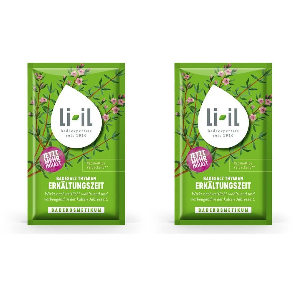 Zwei grüne Beutel mit dem Logo Li-il. Aufschrift: Badesalz Thymian Erkältungszeit. Text: Badekosmetikum. Mit floralem Hintergrund.