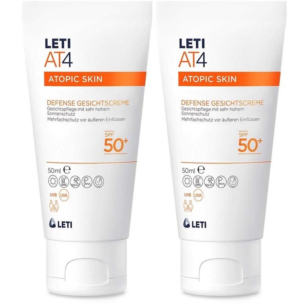 Zwei weiße Tuben LETI AT4 Defense Gesichtscreme SPF 50+. Aufschrift: ATOPIC SKIN, SPF 50+, 50ml. Logos und Piktogramme.