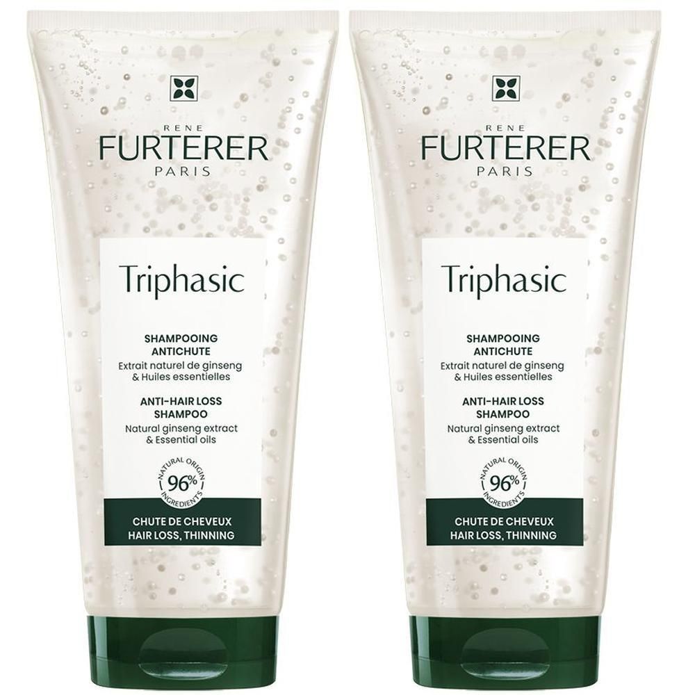 Zwei Tuben TRIPHASIC Shampoo. Transparentes Shampoo mit weißem Etikett. Marke: René Furterer Paris. Text: Anti-Haarausfall Shampoo.
