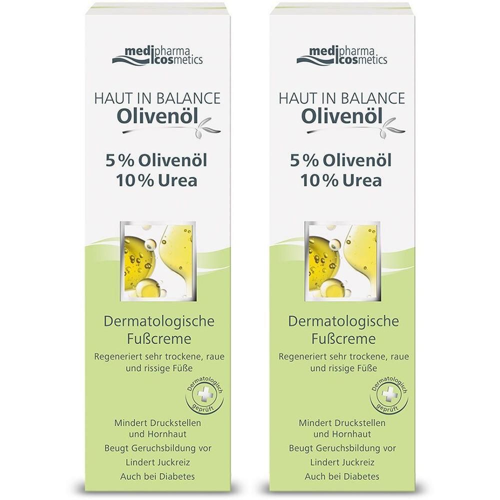 Zwei Faltschachteln. Aufdruck: HAUT IN BALANCE Olivenöl, 5% Olivenöl, 10% Urea. Dermatologische Fußcreme. Grün-weiß.