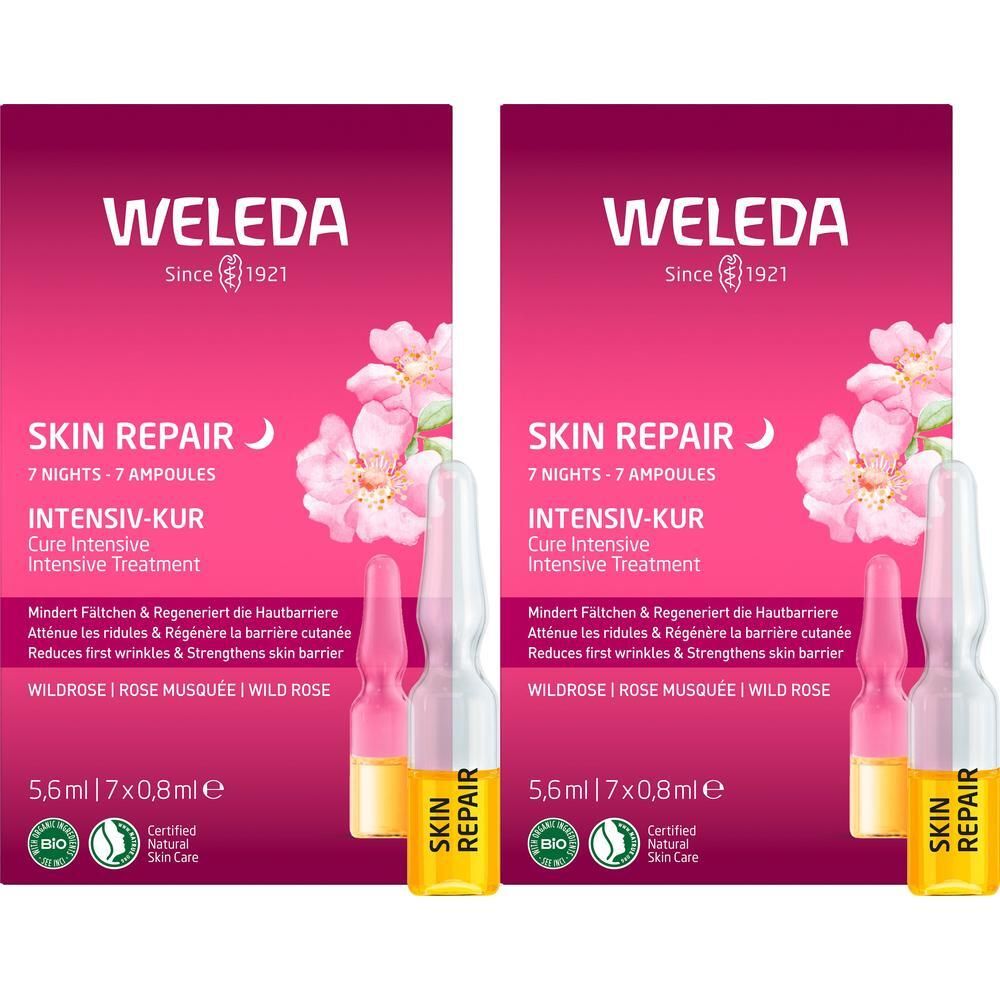 Zwei Packungen WELEDA Skin Repair Intensiv-Kur. Jede Packung enthält 7 Ampullen. Aufdrucke: WELEDA, Skin Repair, Intensiv-Kur, Wildrose.