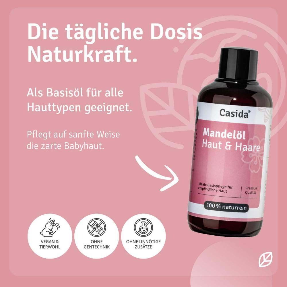 Eine Flasche MANDELÖL Haut & Haare naturrein. Braune Flasche mit schwarzem Deckel und weißem Etikett. Aufschrift: Casida, Mandelöl Haut & Haare. Vegan & tierwohl.