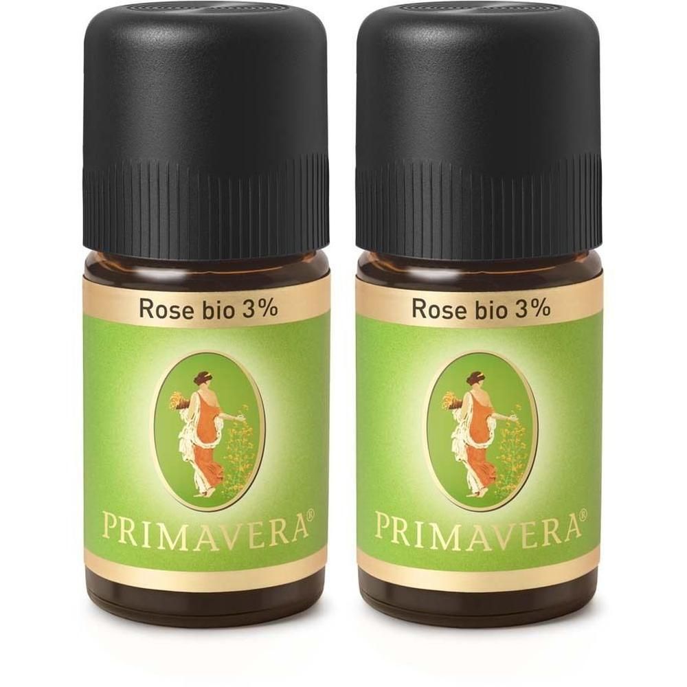Zwei Flaschen mit schwarzem Deckel und grünen Etiketten. Aufschrift: Rose bio 3% und PRIMAVERA. Abbildung einer Frau.
