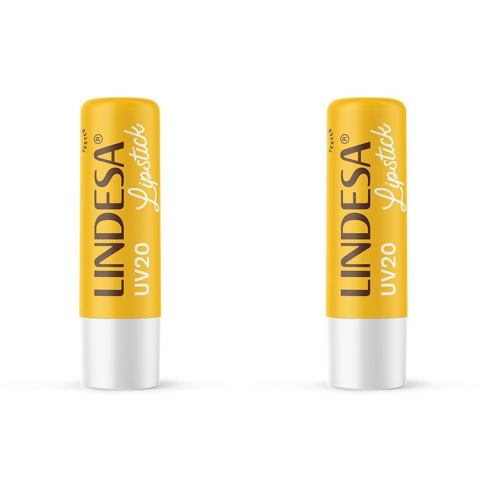 Zwei gelbe Lippenpflegestifte mit weißem Boden. Aufschrift: LINDESA Lipstick UV20.