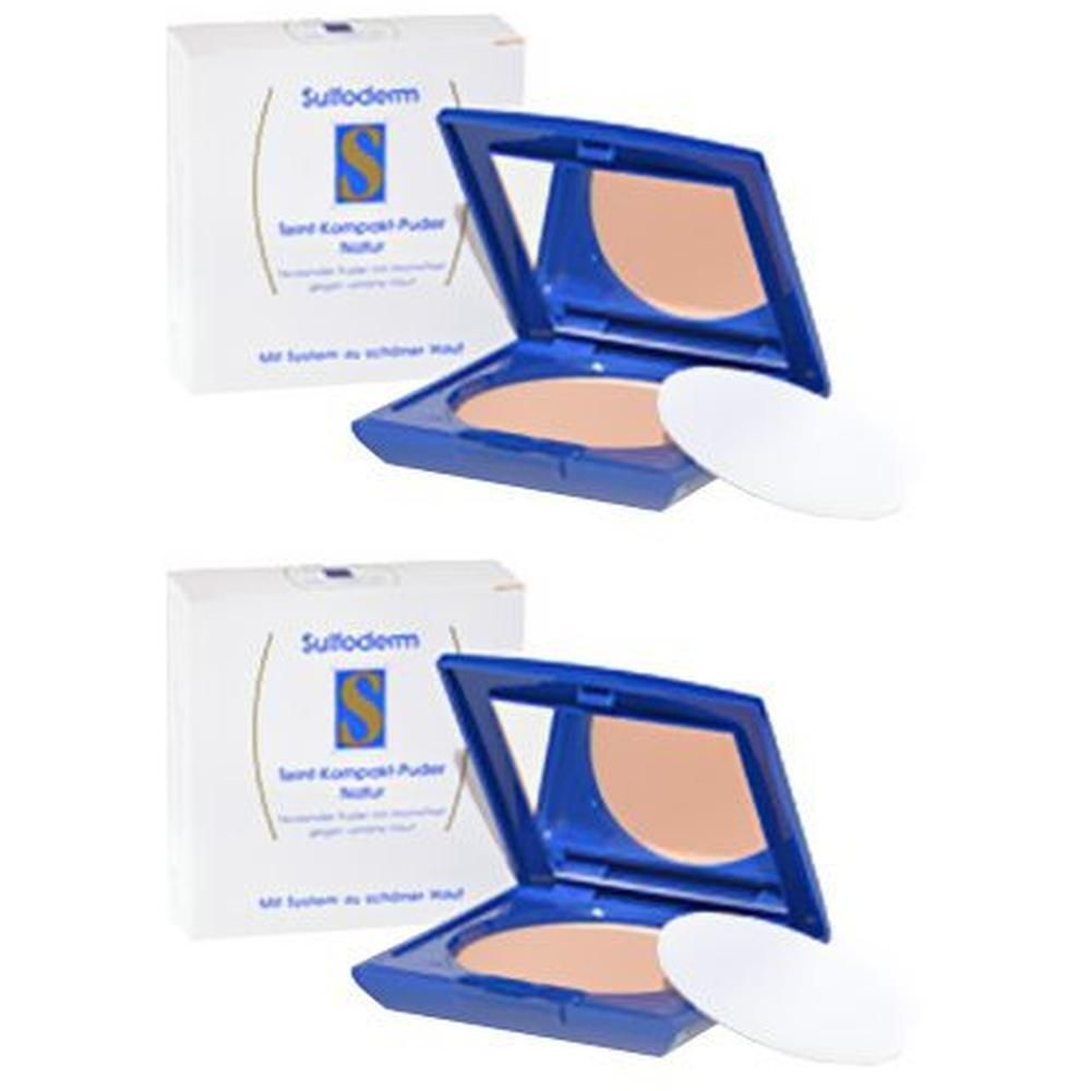 Zwei Kompaktpuder-Verpackungen. Blaue Puder-Dosen mit Spiegel und Schwamm. Weiße Kartons mit Produktnamen und Logo.