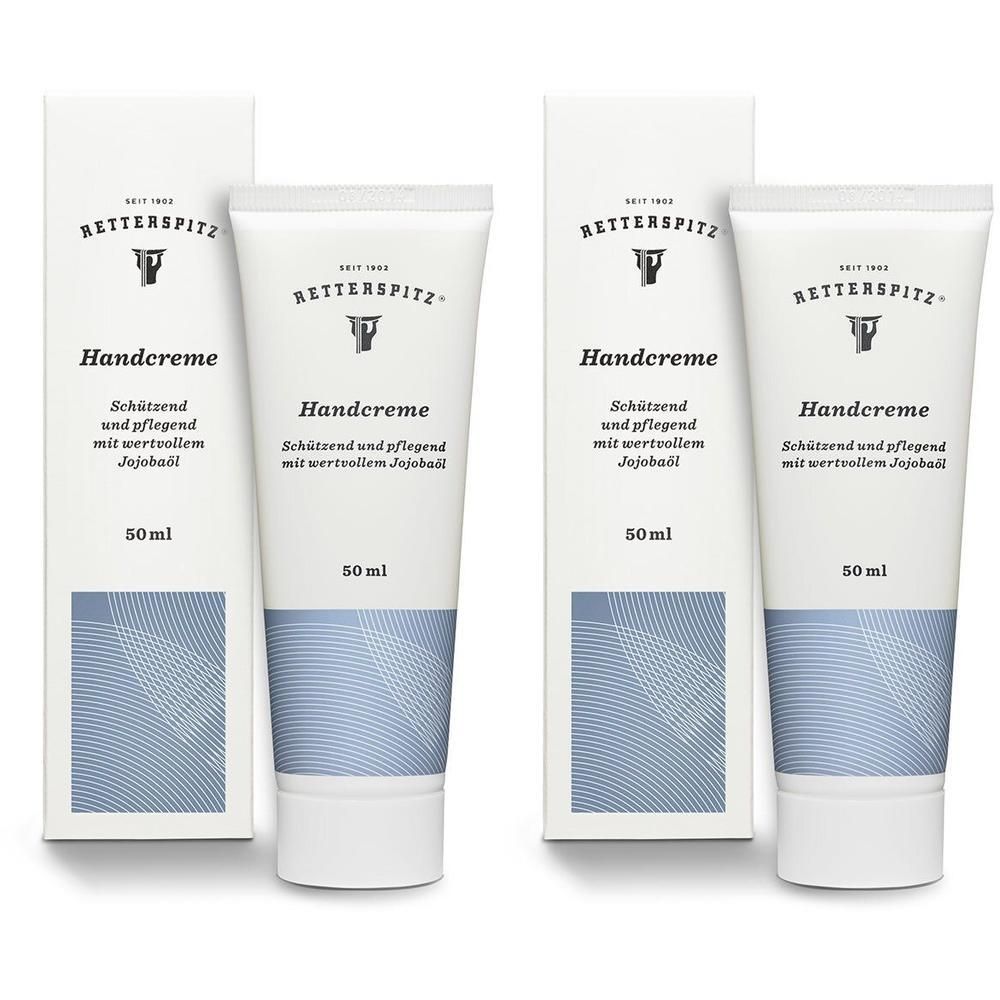 Zwei Tuben Handcreme mit Faltschachteln. Aufschrift: RETTERSPITZ, Handcreme, 50 ml. Blaue Musterung.