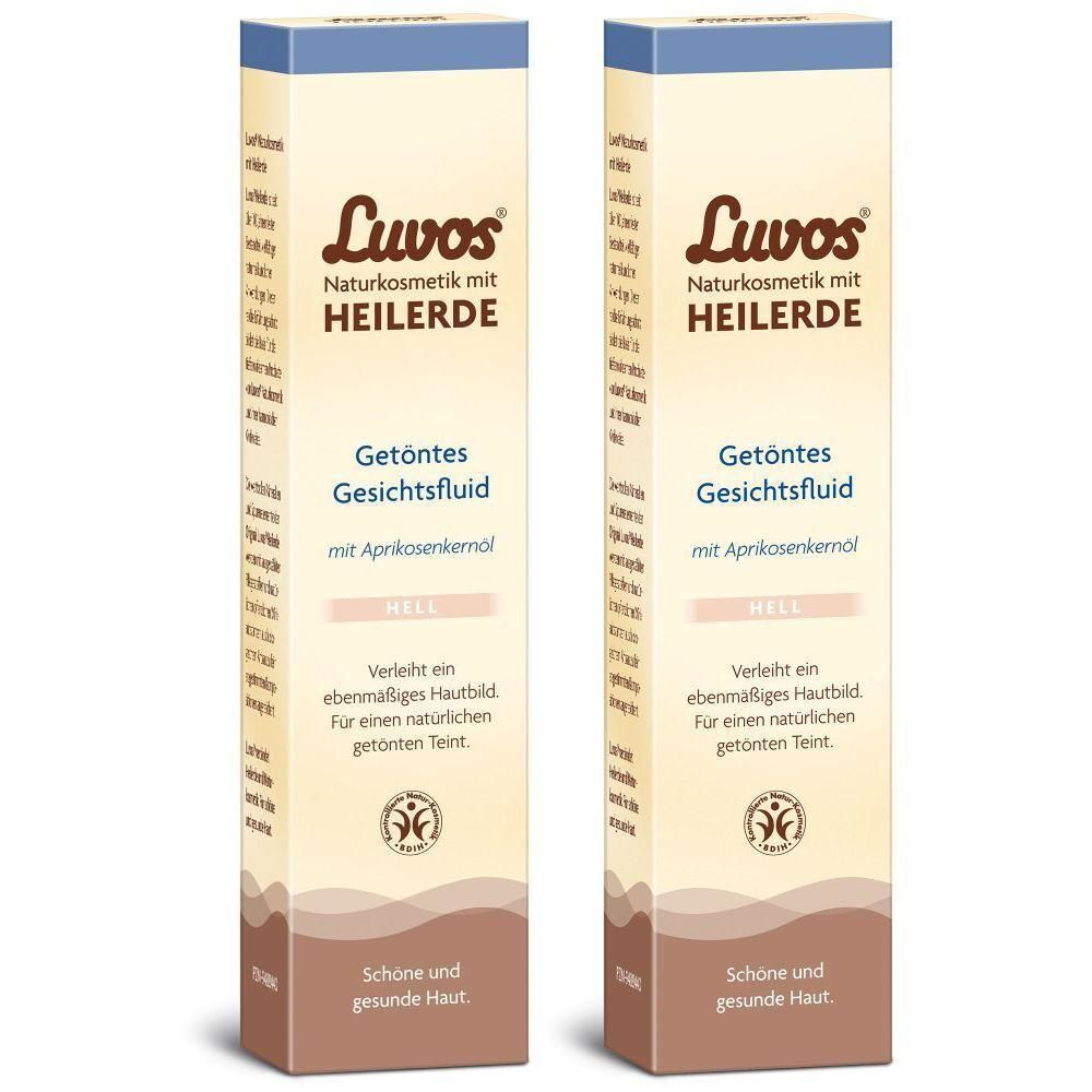 Zwei Kartons LUVOS getöntes Gesichtsfluid hell. Aufdruck: Naturkosmetik mit Heilerde, Getöntes Gesichtsfluid mit Aprikosenkernöl.