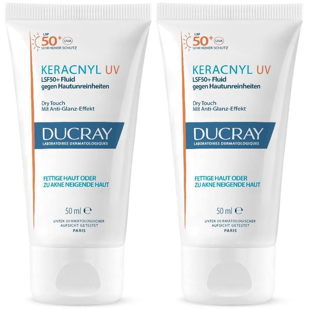 Zwei Tuben DUCRAY KERACNYL UV Fluid LSF50+ gegen Hautunreinheiten. Weiße Tuben mit blauer und orangefarbener Schrift.