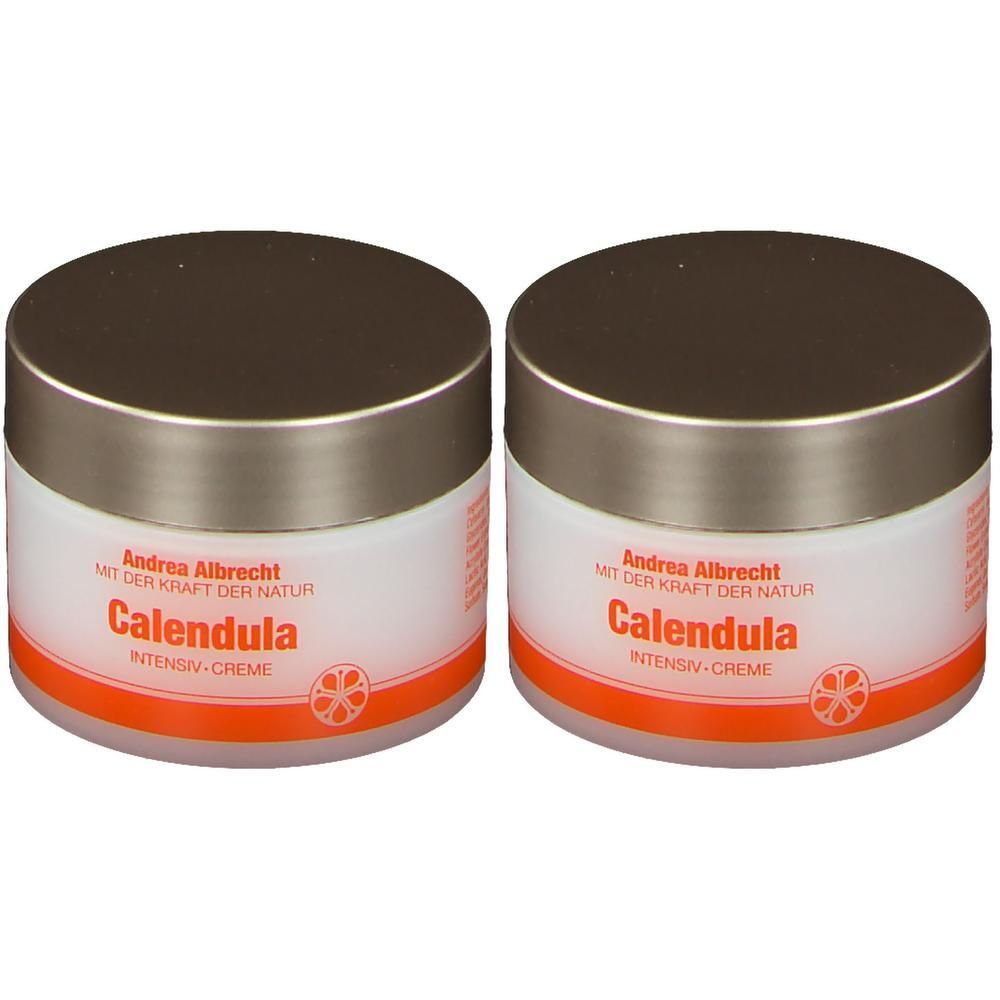 Zwei Cremetiegel mit silberfarbenen Deckeln. Auf den weißen Etiketten steht "Andrea Albrecht Calendula INTENSIV-CREME".