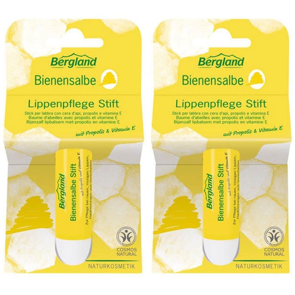 Zwei Lippenpflegestifte in gelber Verpackung. Aufschrift: Bergland Bienensalbe, Lippenpflege Stift. Mit COSMOS NATURAL Siegel.