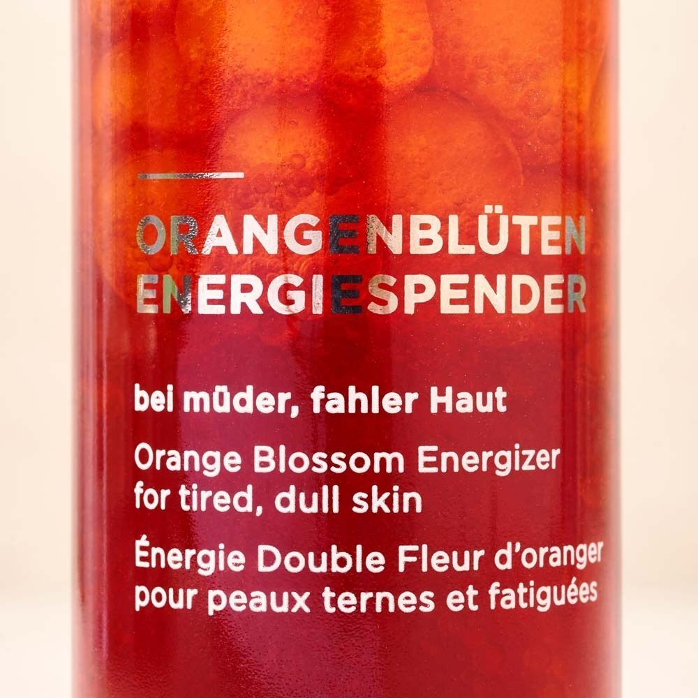 Nahaufnahme des ANNEMARIE BÖRLIND Orangenblüten Energiespenders mit Text.