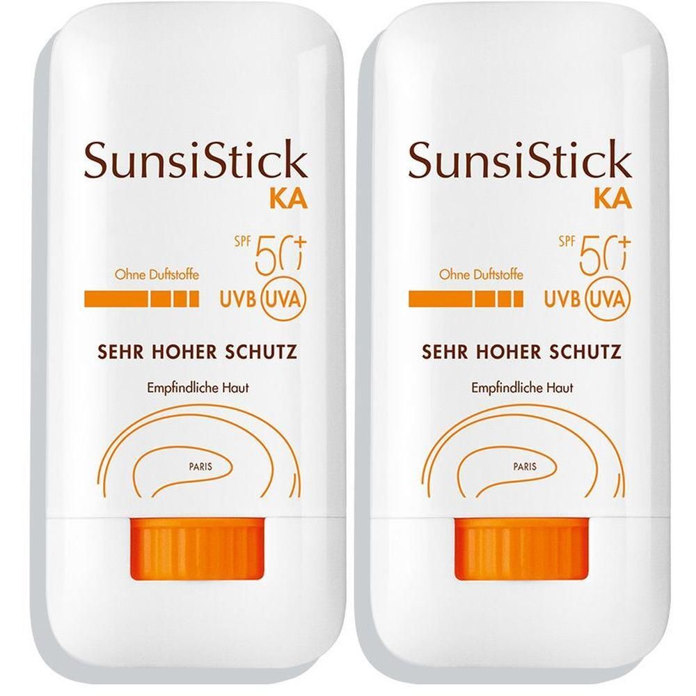 Zwei weiße Stifte mit orangefarbenen Akzenten. Aufschrift: SunsiStick KA SPF 50+. Sehr hoher Schutz. Ohne Duftstoffe. Für empfindliche Haut.