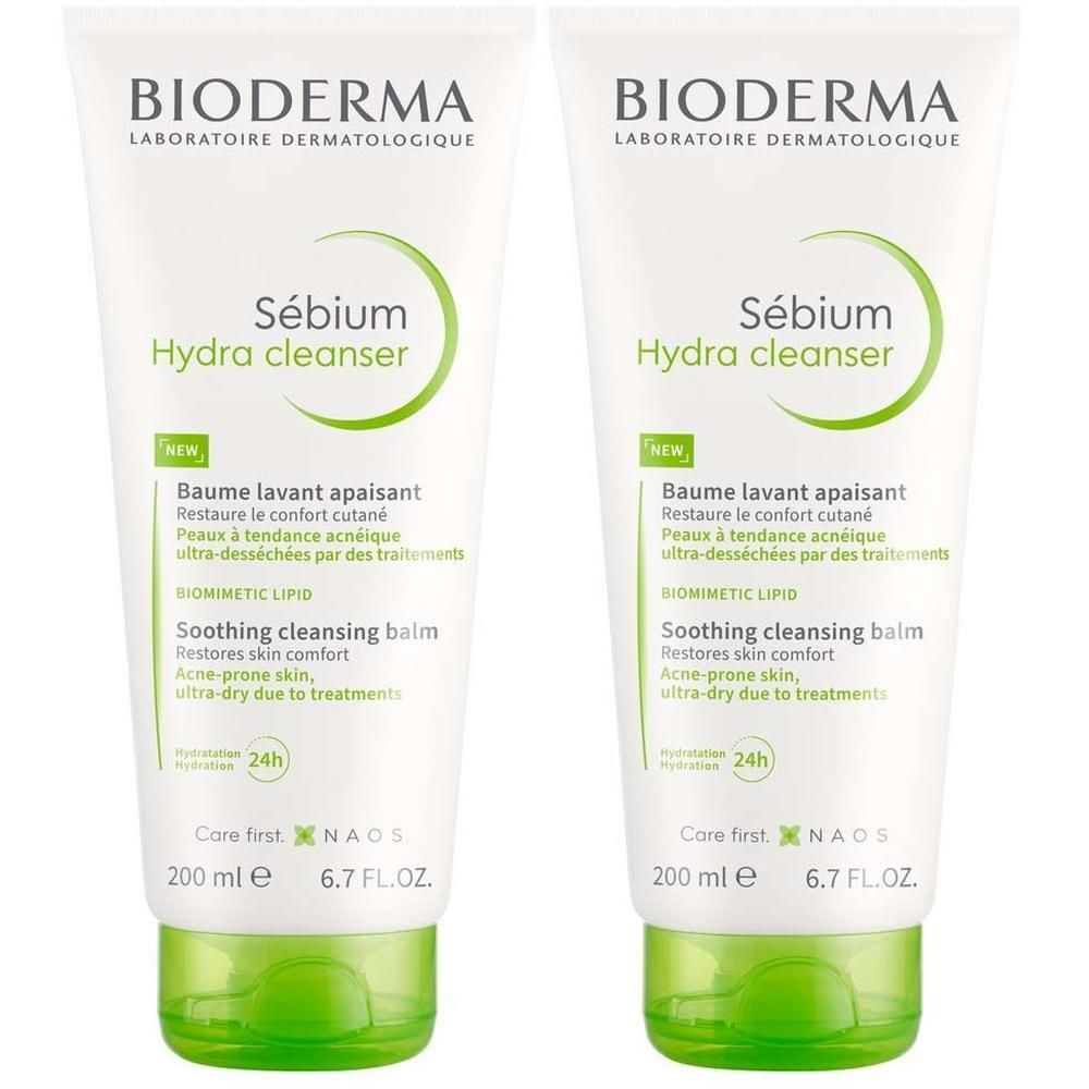 Zwei Tuben BIODERMA Sébium Hydra Cleanser. Weiße Tuben mit grünen Akzenten. Text: Sébium Hydra cleanser, Baume lavant apaisant.