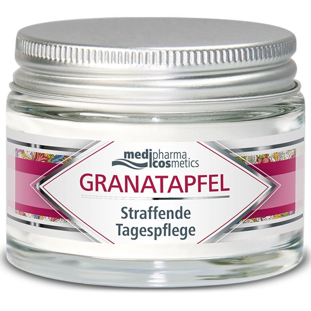 Glas mit Tagespflege. Silberner Deckel. Etikett mit Logo und Produktnamen in einem rautenförmigen Feld. Text: Granatapfel, Straffende Tagespflege.