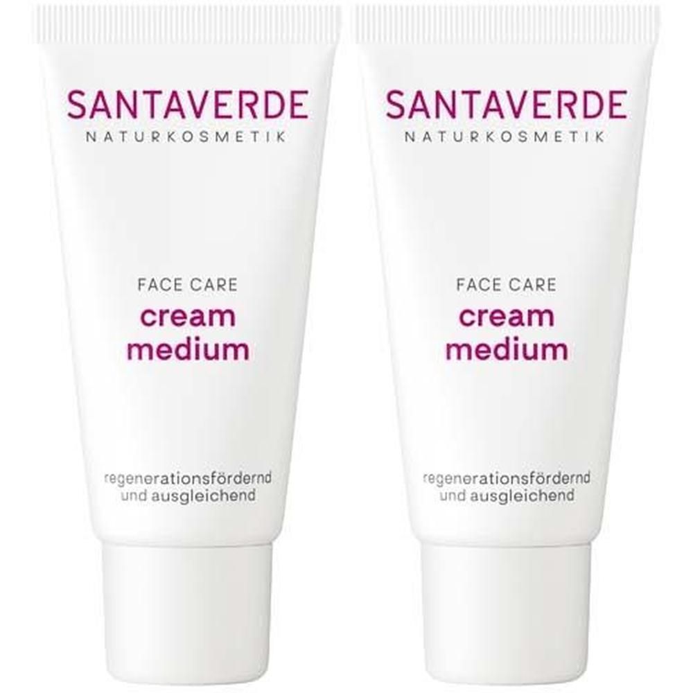 Zwei Tuben SANTAVERDE Creme medium. Weiße Tuben mit lila Schriftzug. Aufschrift: FACE CARE cream medium. Regenerationsfördernd und ausgleichend.