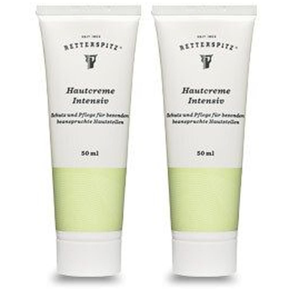 Zwei Tuben RETTERSPITZ Hautcreme Intensiv. Weiße Tuben mit grüner Markierung und Produktbezeichnung. 50 ml.