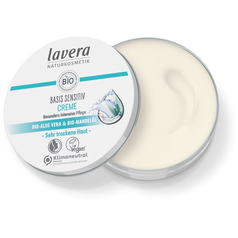 Offener runder Tiegel. Aufschrift: lavera, BIO, BASIS SENSITIV CREME, Bio-Aloe Vera & Bio-Mandelöl. Vegan-Siegel.