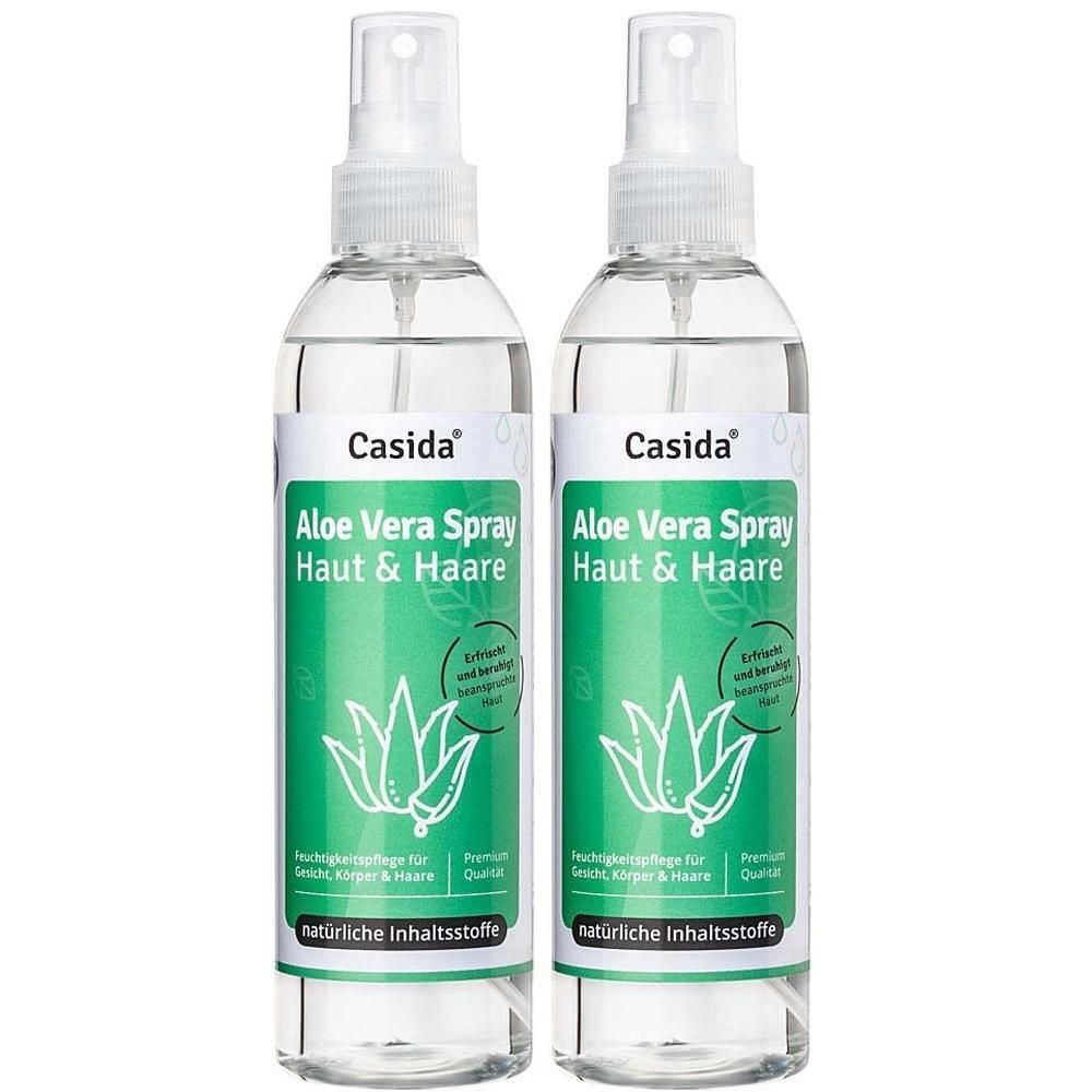 Zwei Sprühflaschen ALOE VERA SPRAY Haut & Haare. Klare Flaschen mit weißem Sprühkopf und grünem Etikett mit Produktinformationen.