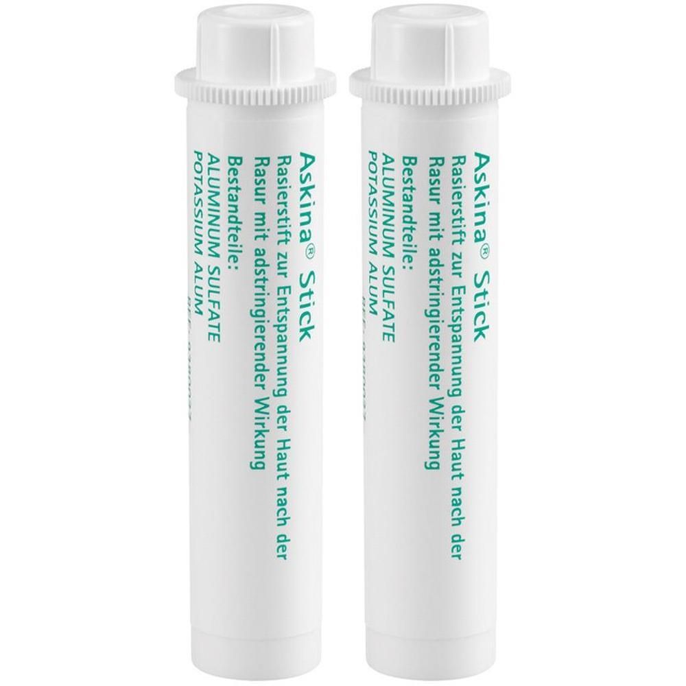 Zwei weiße Askina® Stick Rasierstifte. Aufschrift: Rasierstift zur Entspannung der Haut nach der Rasur mit adstringierender Wirkung. Bestandteile: ALUMINIUM SULFATE, POTASSIUM ALUM.