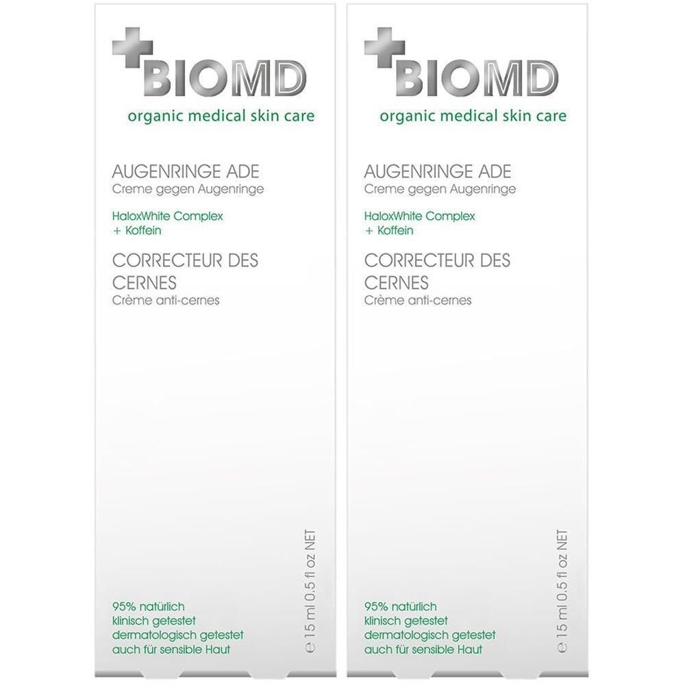 Zwei weiße Faltschachteln mit BIOMD-Logo und Produktbezeichnung. Text: Augenringe Ade, Corrector des cernes. 15 ml.