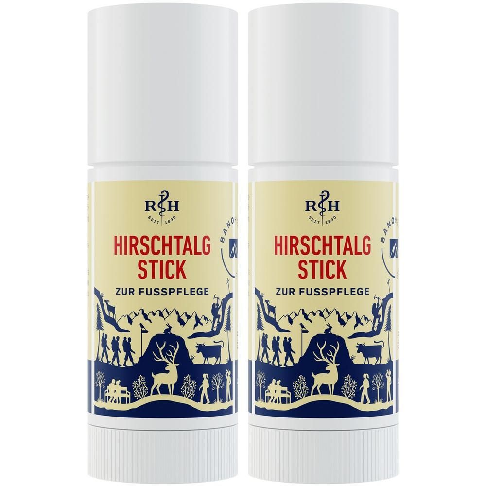 Zwei weiße Stifte mit gelben Etiketten. Aufschrift: Hirschtalg Stick zur Fusspflege. Illustration mit Berglandschaft und Figuren.