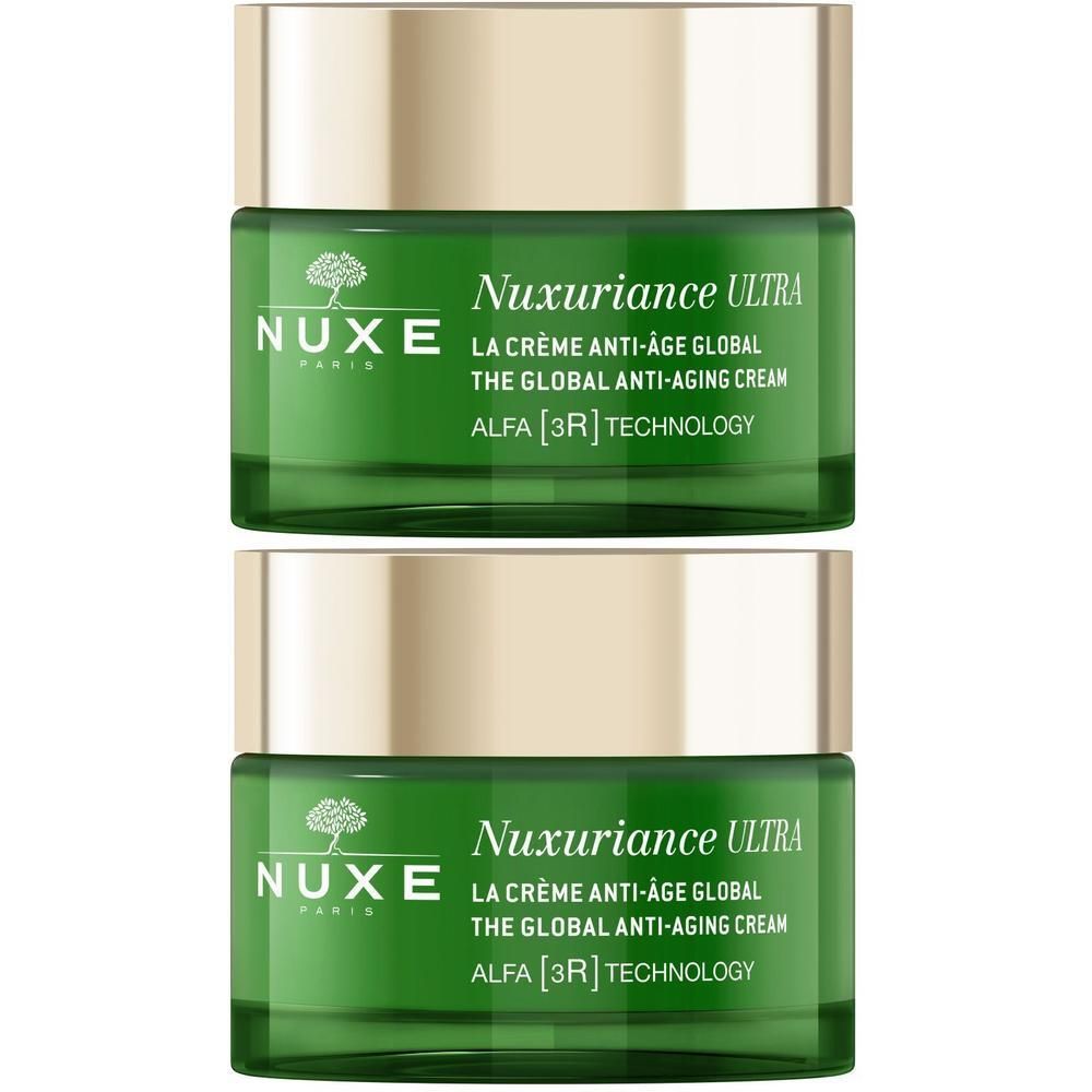 Zwei grüne Tiegel NUXE Nuxuriance® ULTRA Tagescreme. Weißer Deckel, grüne Glasbehälter. Text: NUXE, Nuxuriance ULTRA, La Crème Anti-Âge Global.