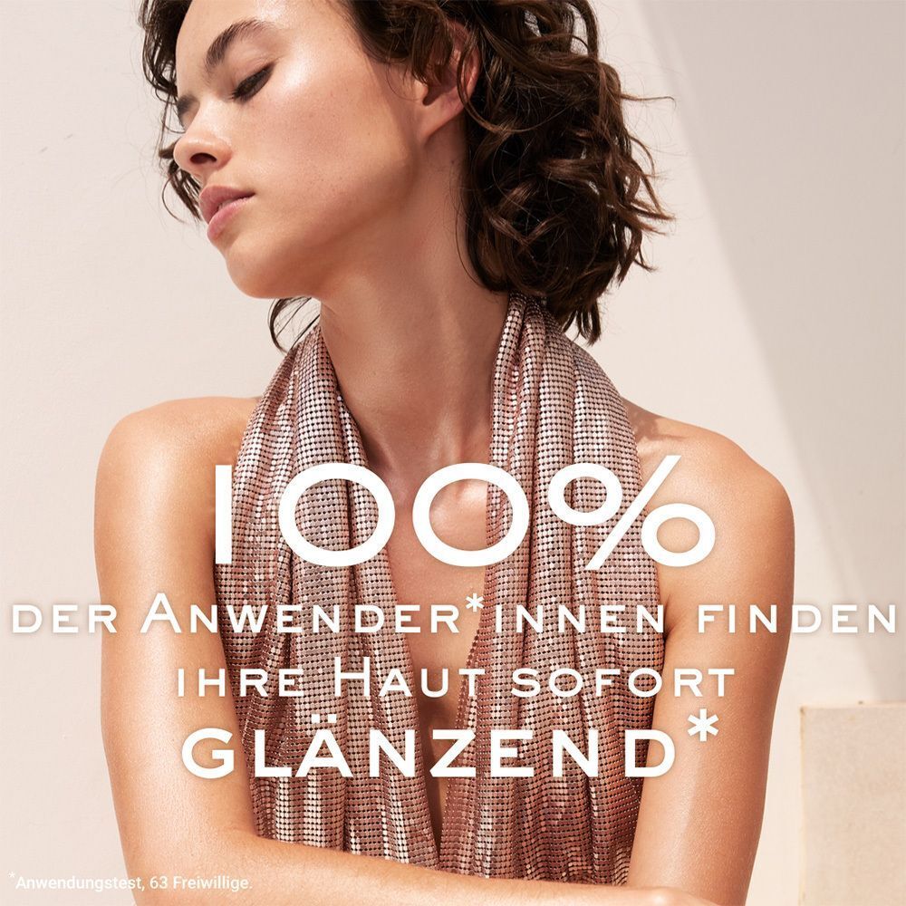 Eine Frau mit glänzender Haut. Text: 100% der Anwender*innen finden ihre Haut sofort glänzend.
