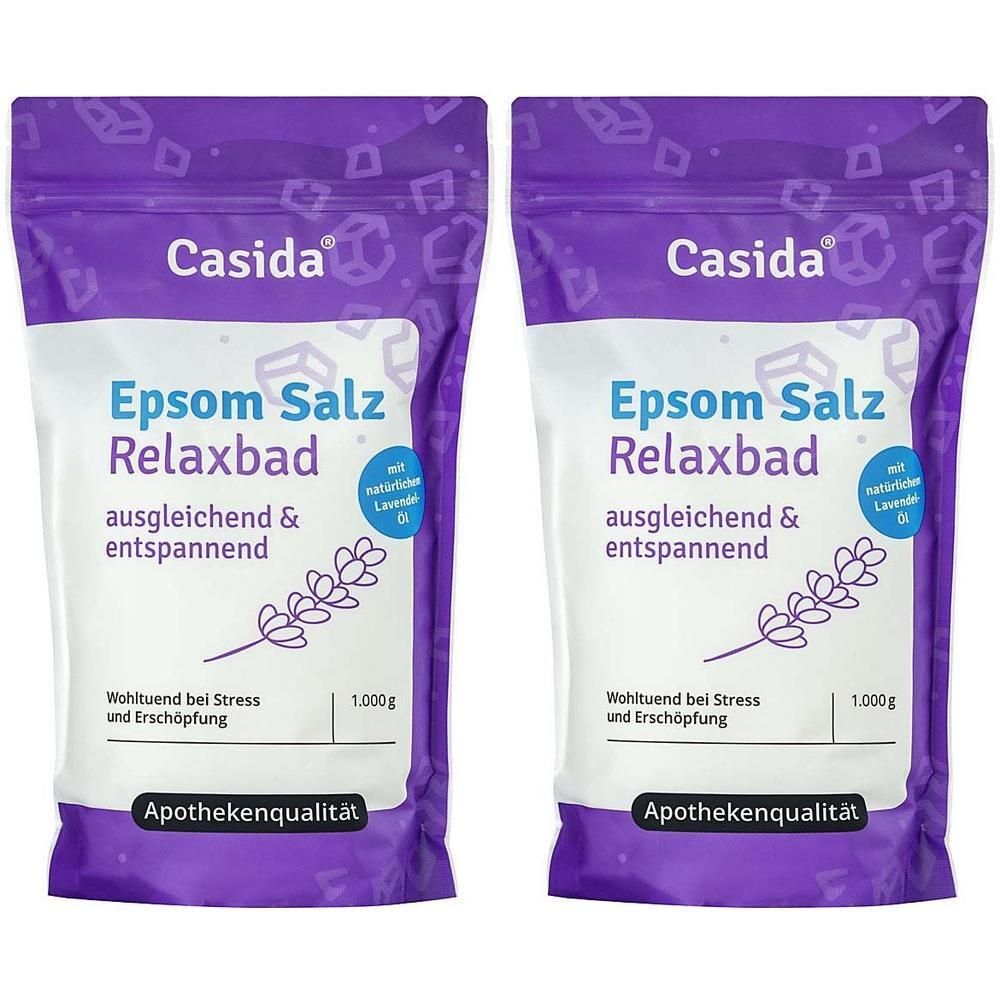 Zwei Beutel Epsom Salz Relaxbad. Lila Verpackung mit weißem Feld und Produktinformationen. Lavendel-Illustration.