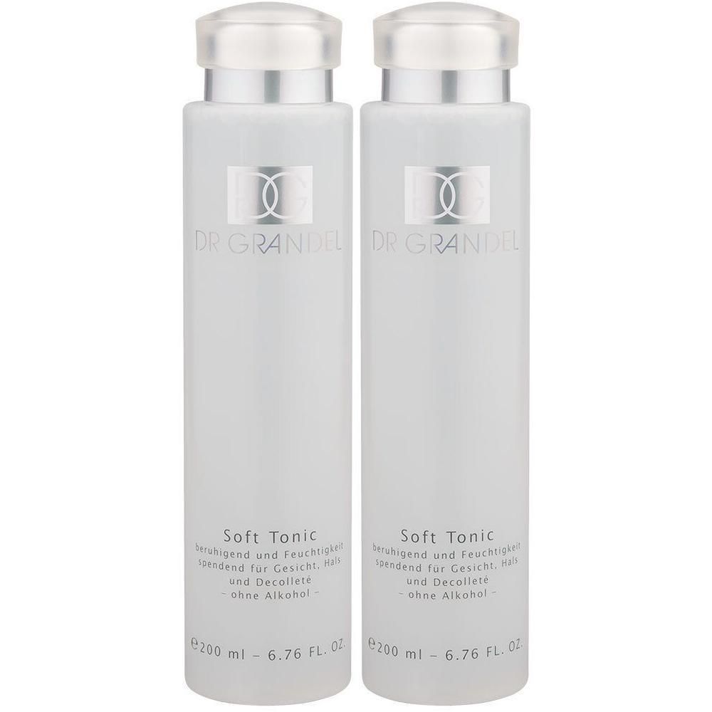 Zwei Flaschen Soft Tonic. Weiße Flaschen mit silbernen Deckeln. Aufschrift: DR. GRANDEL, Soft Tonic, ohne Alkohol.