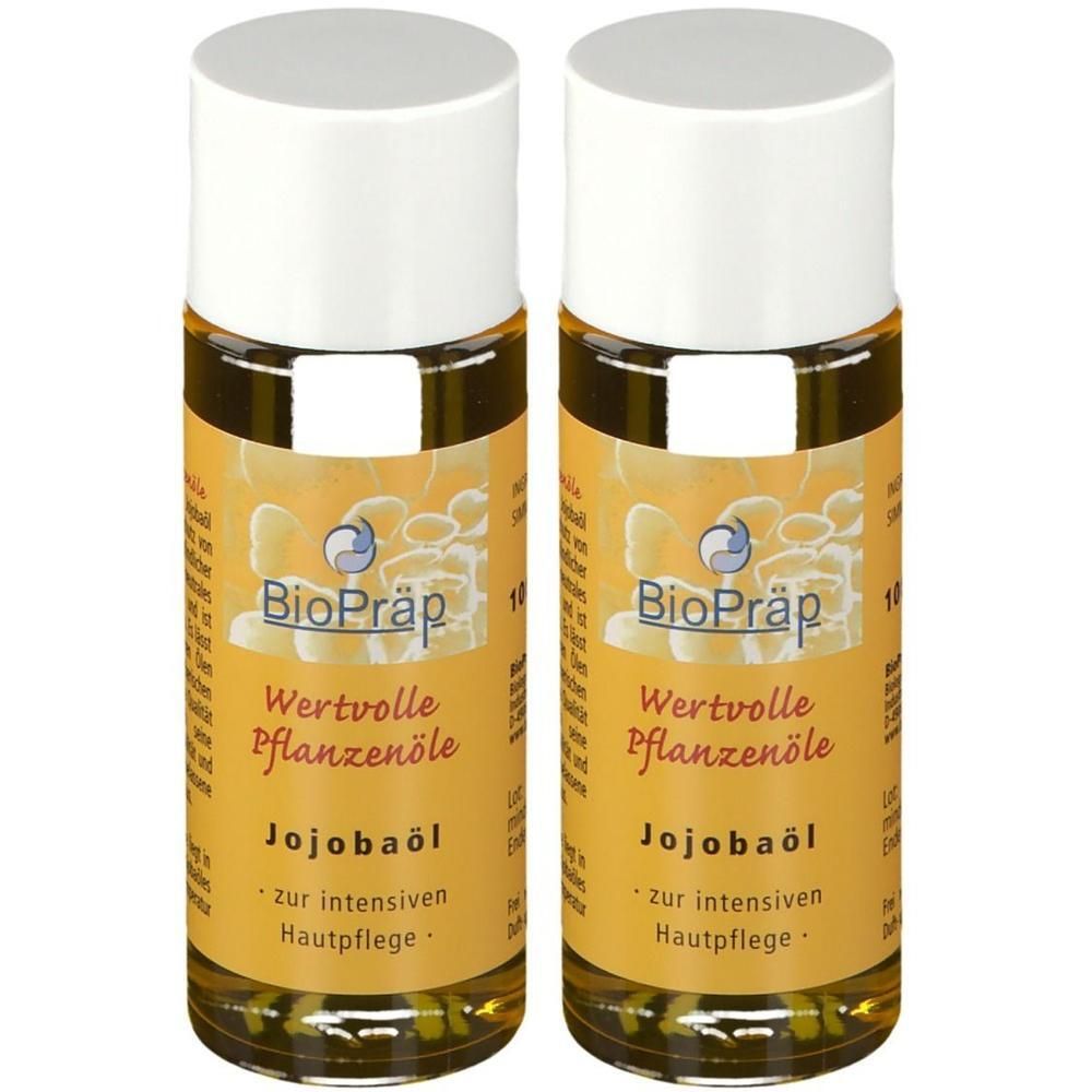 Zwei Flaschen Jojobaöl mit weißem Deckel. Aufschrift: BioPräp, Wertvolle Pflanzenöle, Jojobaöl, zur intensiven Hautpflege.