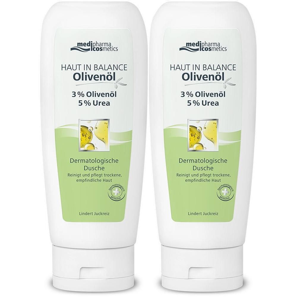 Zwei weiße Flaschen mit grünen Etiketten. Aufschrift: medipharma cosmetics, Olivenöl, Dermatologische Dusche. Enthält 3% Olivenöl und 5% Urea.
