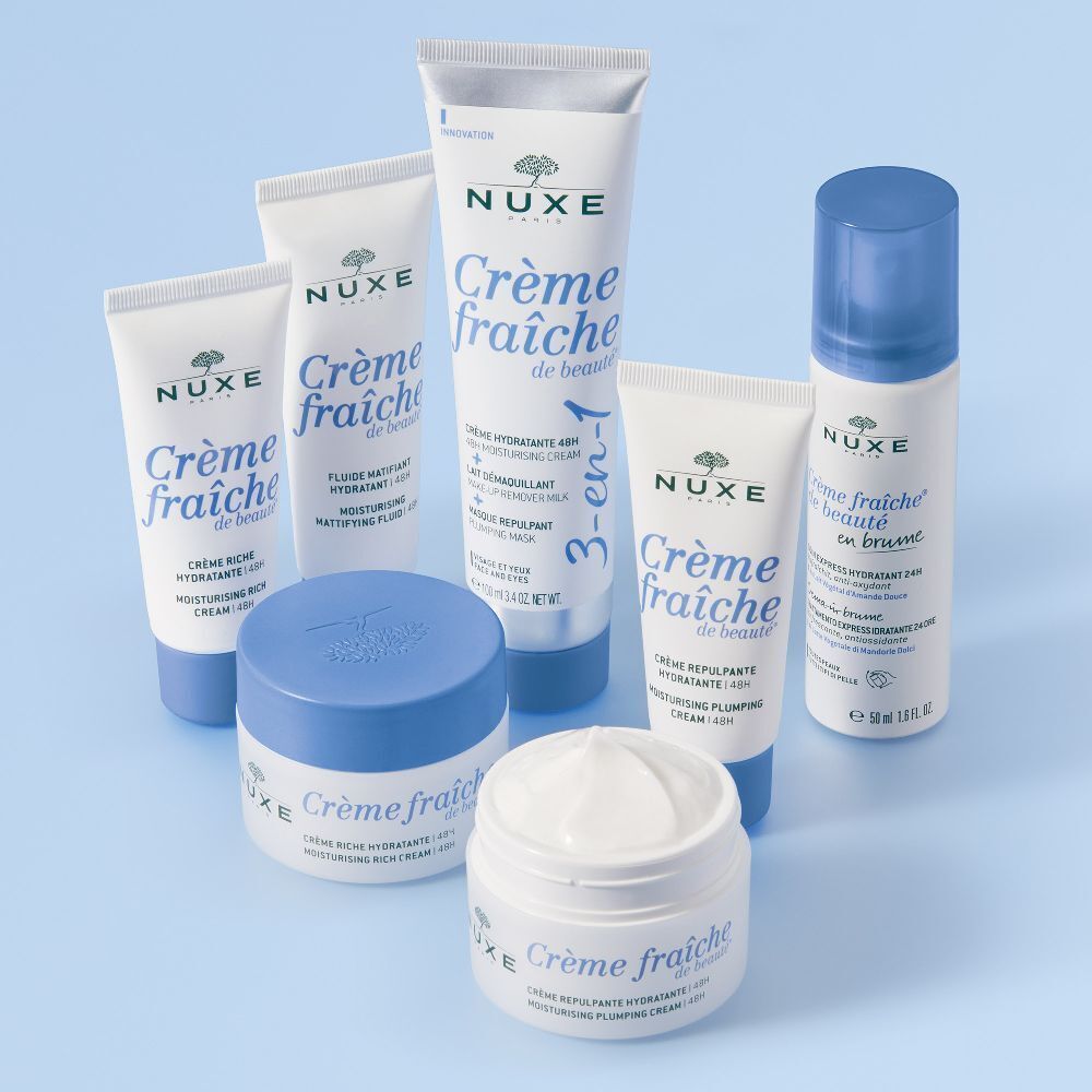 Verschiedene NUXE-Produkte: Cremes, Tuben und Sprays. Aufschrift: Crème fraîche de beauté, 48H Feuchtigkeit.