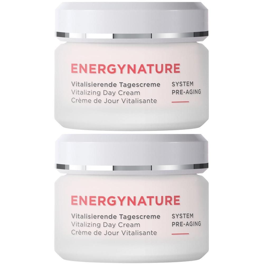 Zwei weiße Tiegel mit ANNEMARIE BÖRLIND ENERGY NATURE Vitalisierende Tagescreme.