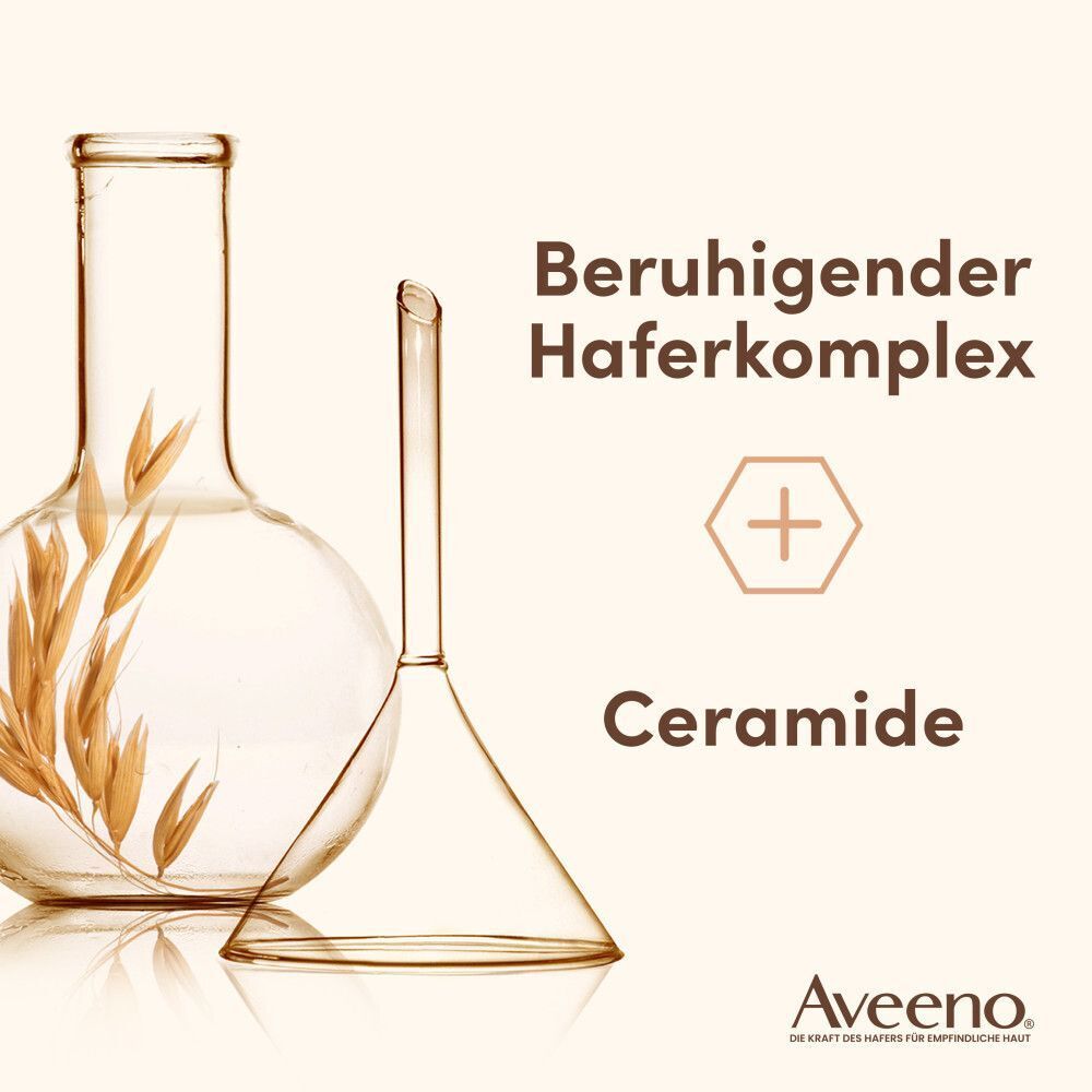 Glasbehälter mit Hafer und Trichter. Text: Beruhigender Haferkomplex + Ceramide. Aveeno Logo.