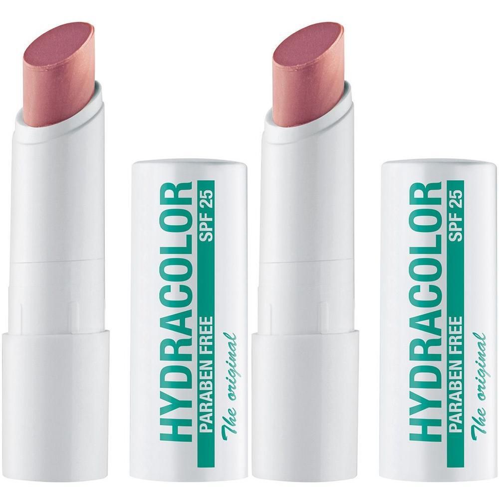 Lippenpflege mit rosa Lippenstift. Weiße Hülle mit grüner Schrift: HYDRACOLOR, PARABEN FREE, SPF 25. Zwei Lippenstifte offen.