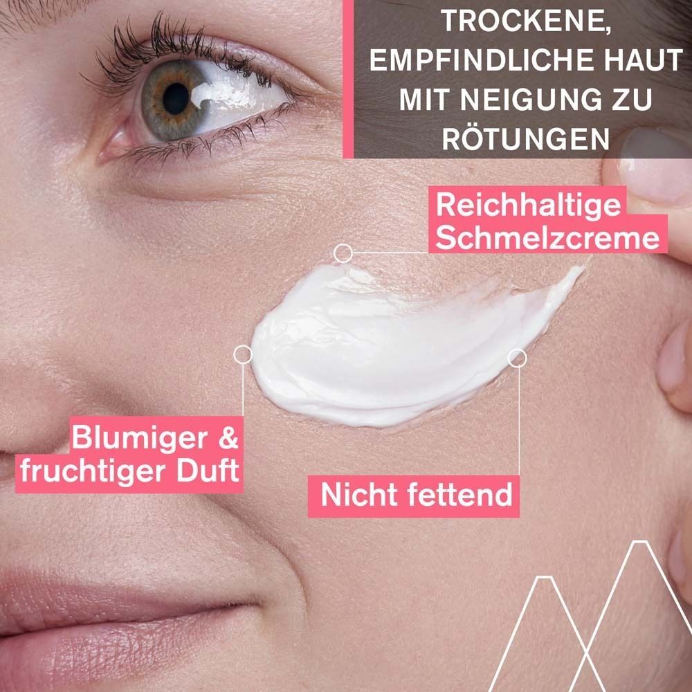 Nahaufnahme einer Hautpartie mit Creme. Text: Trockene, empfindliche Haut mit Neigung zu Rötungen. Reichhaltige Schmelzcreme.