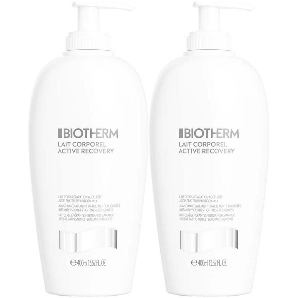 Zwei weiße Flaschen Biotherm Lait Corporel Active Recovery Bodylotion mit Pumpaufsatz. Text auf Etikett.
